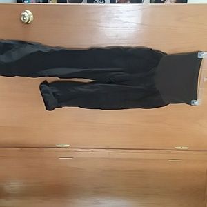 Brown maternity bottoms, full belly